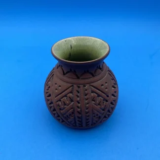 Six Nations Mohawk Pottery carved redware bud vase, green interior, signed, #8