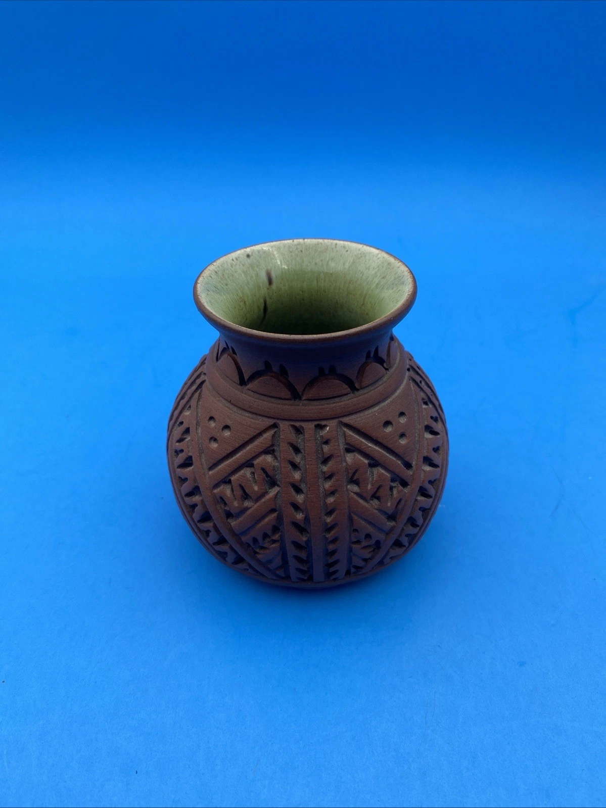 Six Nations Mohawk Pottery carved redware bud vase, green interior, signed, #8