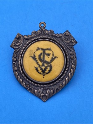 Vintage Enameled TSV Yellow-Black Brooch badge