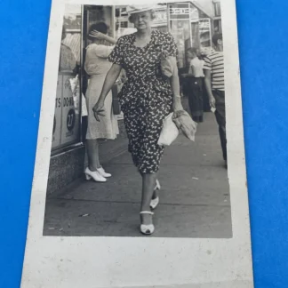 1947 Walking Picture RPPC - Woman Shopping, Donuts 27¢ Sign, ANSCO Street Candid