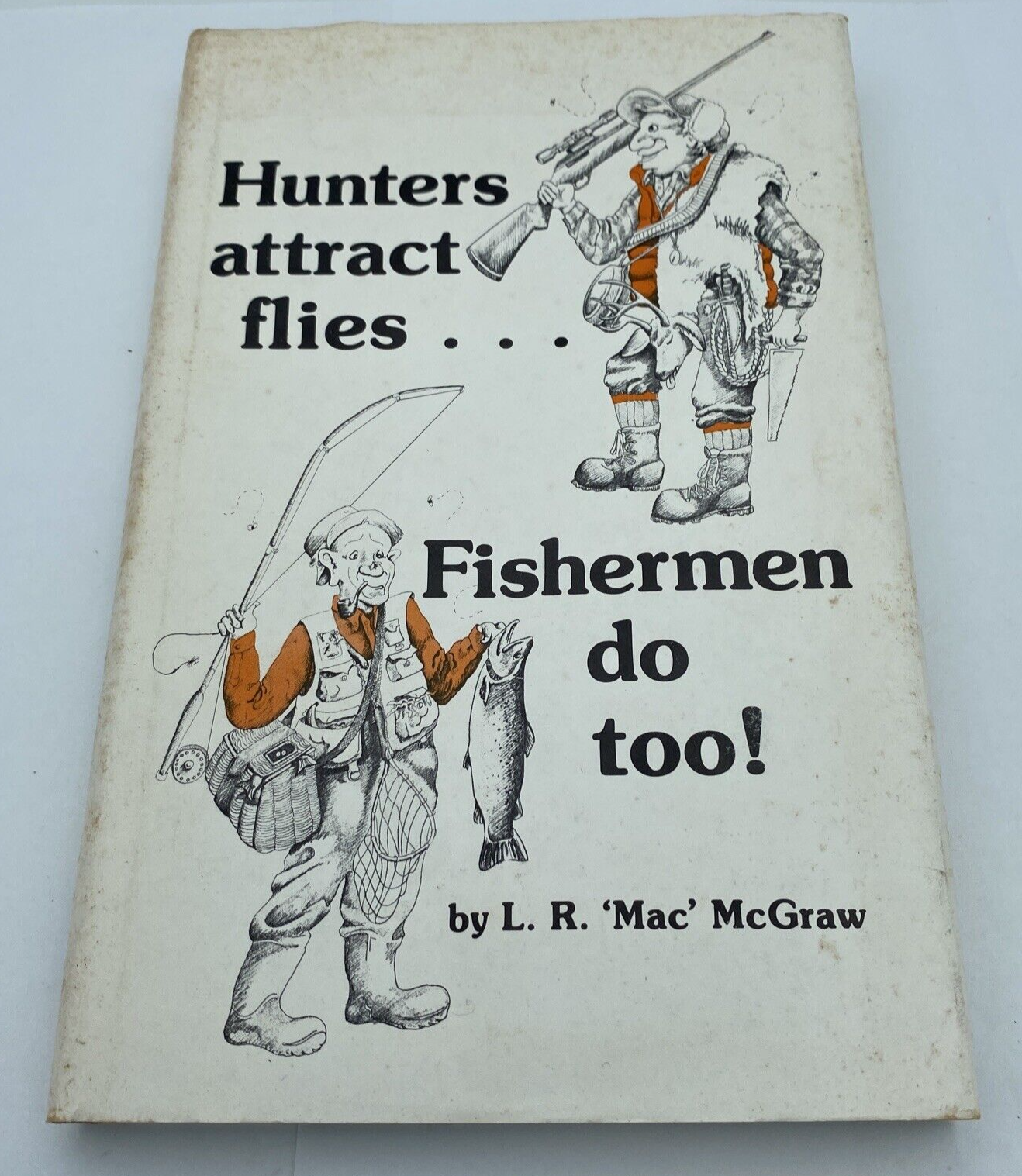 Hunters attract flies-- fishermen do too! Hardcover – 1985 - Signed 1st Edition