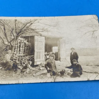 Rare c.1910 AZO RPPC Auto Mechanic Holding Piston Rural Garage Family Farm Scene